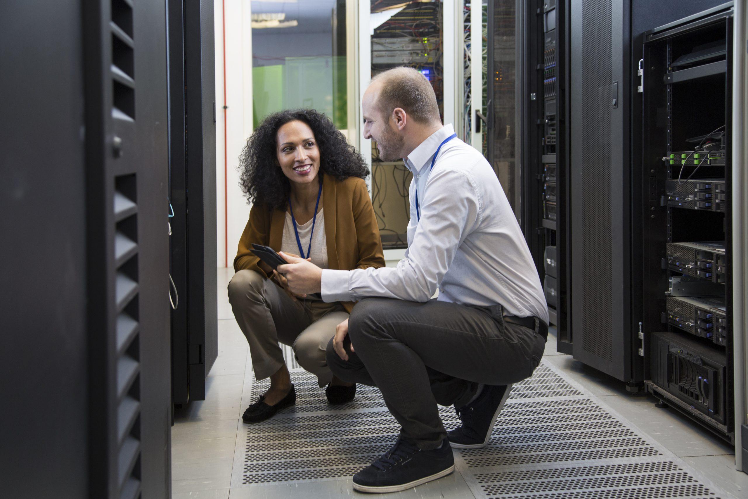 Computer technician in server room